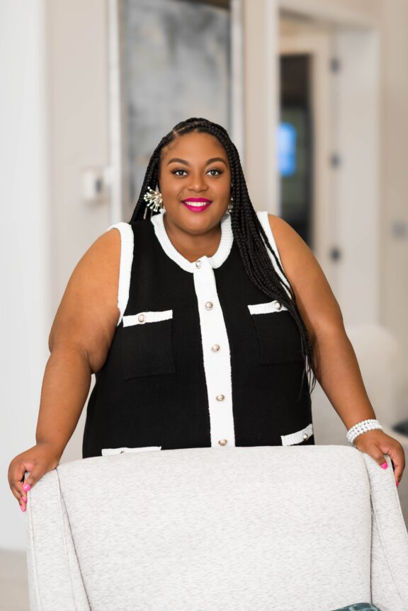 Tiffany Marshall_Clear Resource Marketing_ standing n=behind a chair